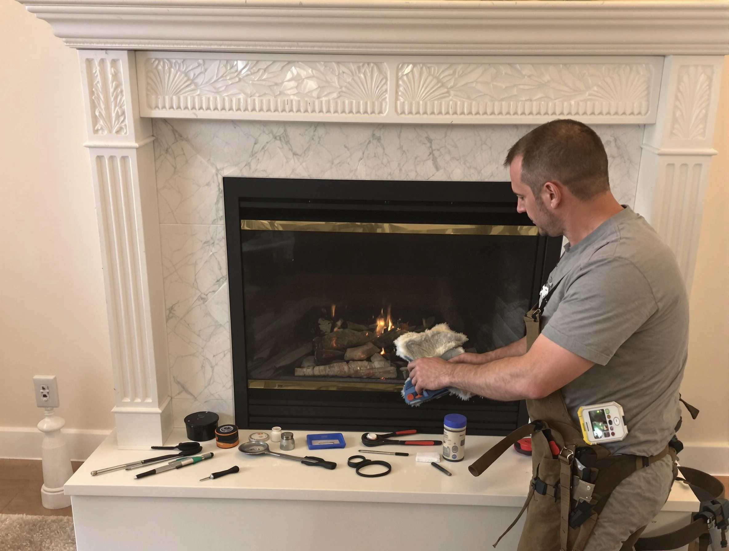 Dacono Chimney Sweep performing fireplace maintenance in Dacono, CO